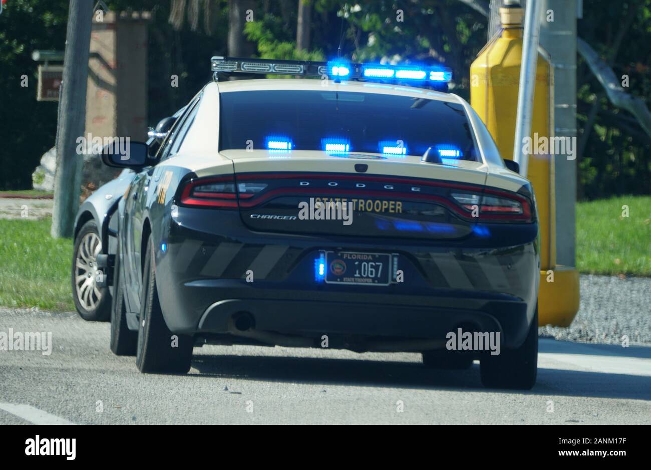 Miami, FL, U.S.A - January 3, 2020 - The Florida State Trooper stopping a driver on the highway Stock Photo