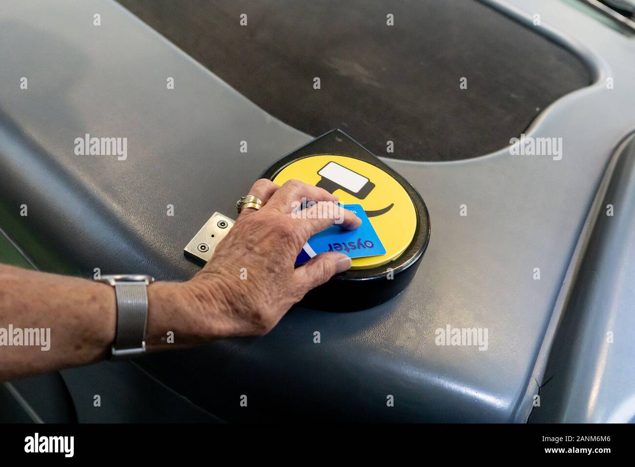 London England August 15 2019; Using London's Oyster Card on reader