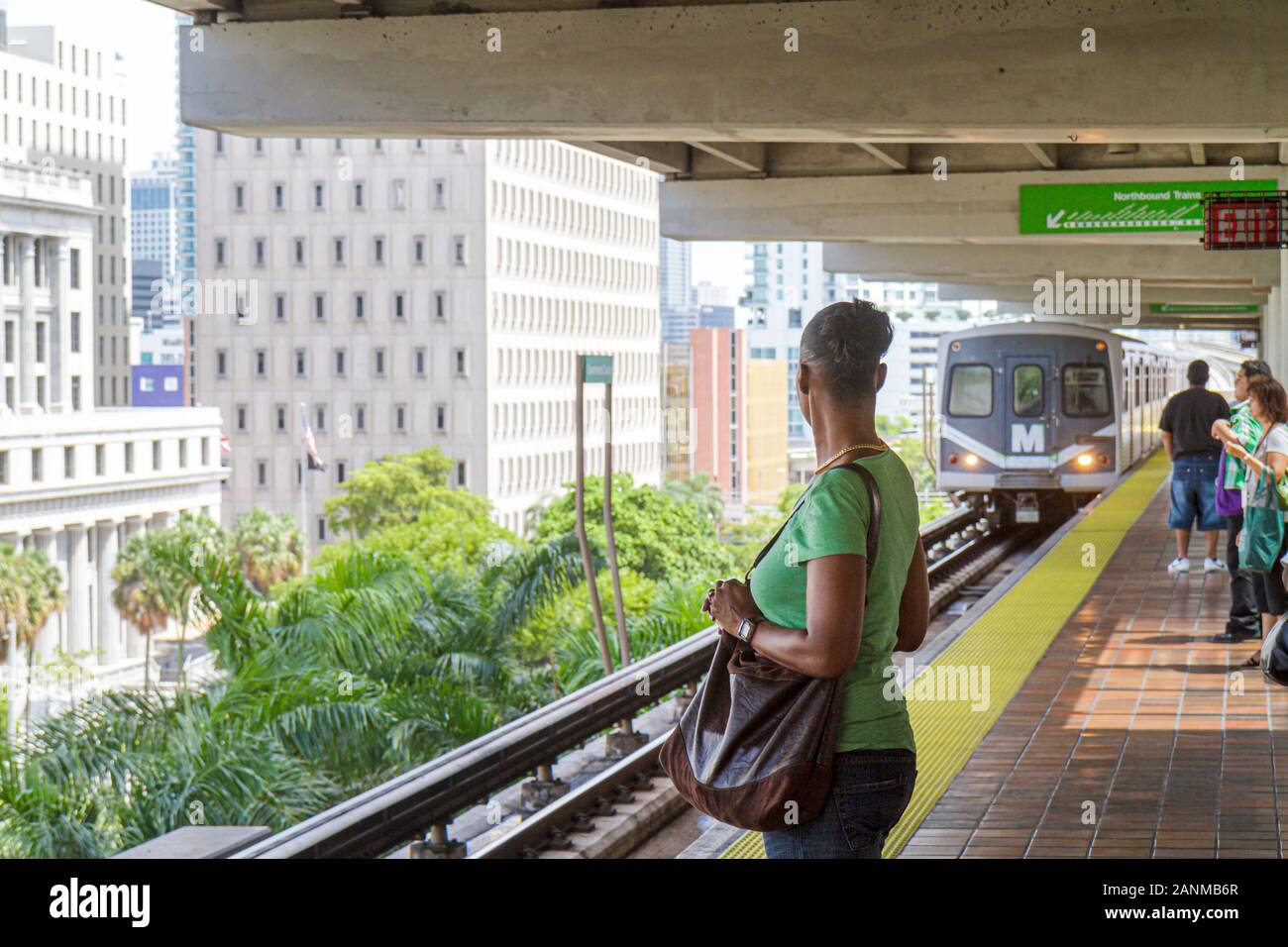 Miami Florida,Government Center,centre,Metrorail Station,Black woman female women,commuter,commuters,approaching train,FL100731006 Stock Photo