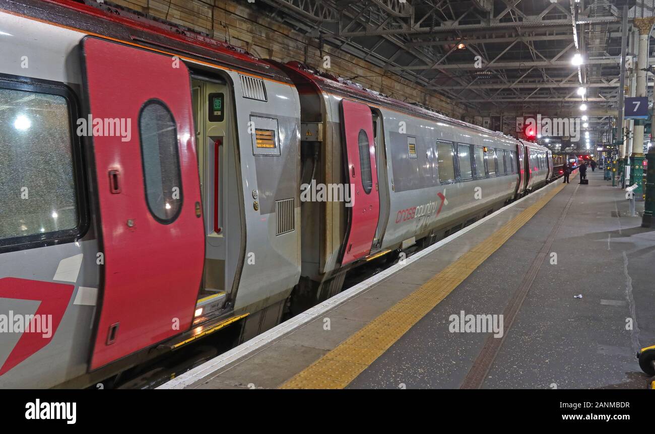 CrossCountry franchise train at platform at Edinburgh Waverley Station at night, Scotland, UK - Class 220 Voyager Stock Photo