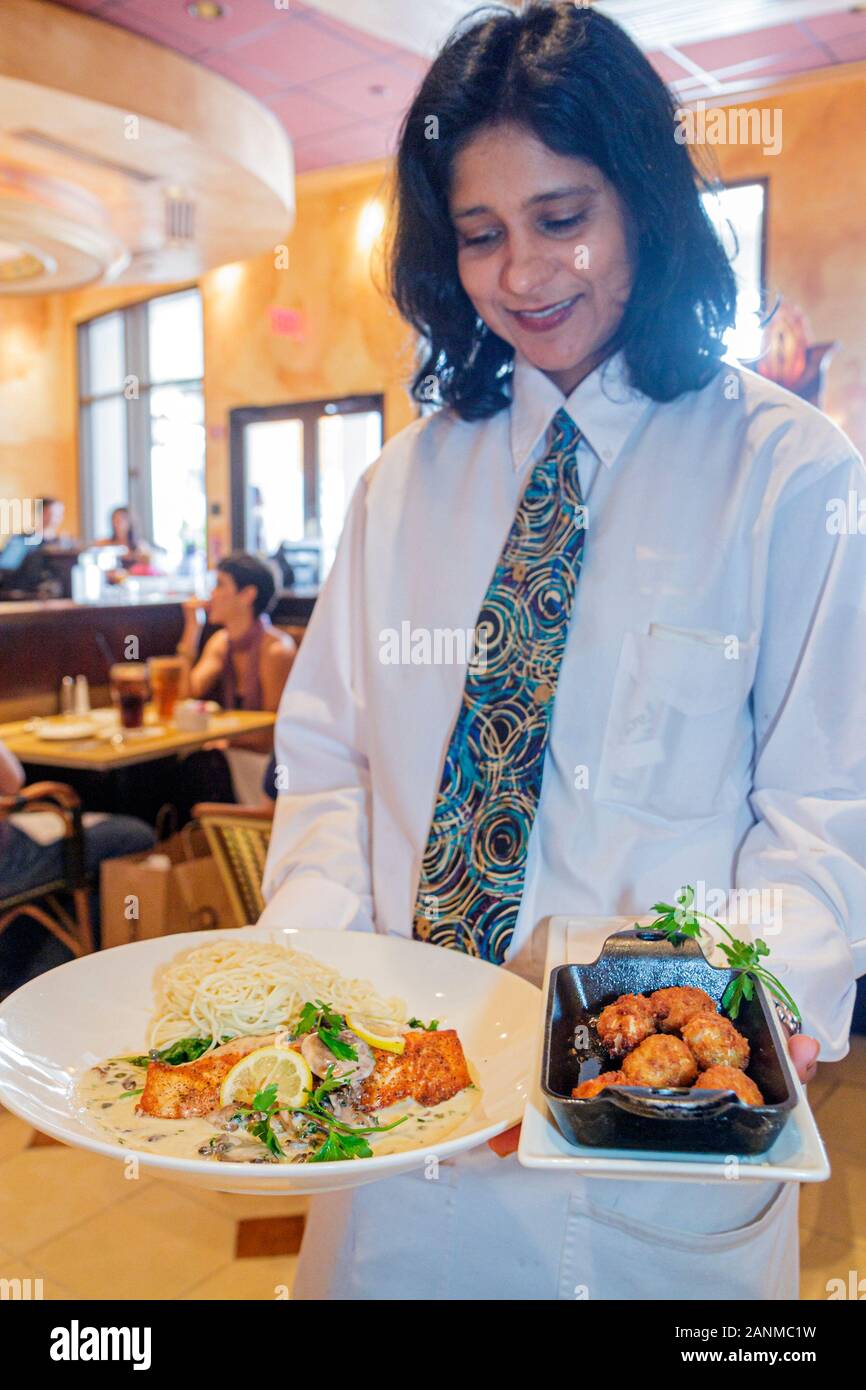 Miami Florida,Aventura,Aventura Mall,Cheesecake Factory,restaurant restaurants food dining eating out cafe cafes bistro,Asian Asians ethnic immigrant Stock Photo