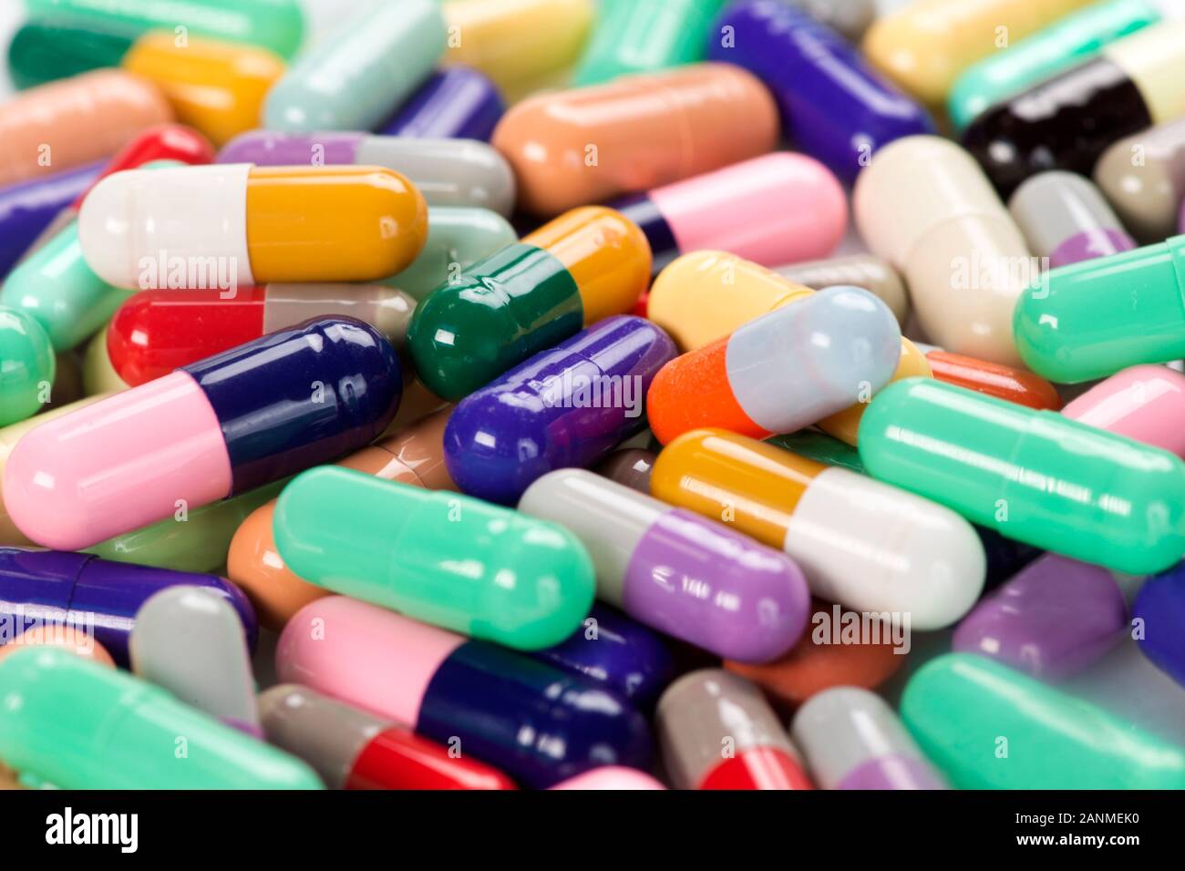 Assortment of many different colored medication capsules Stock Photo