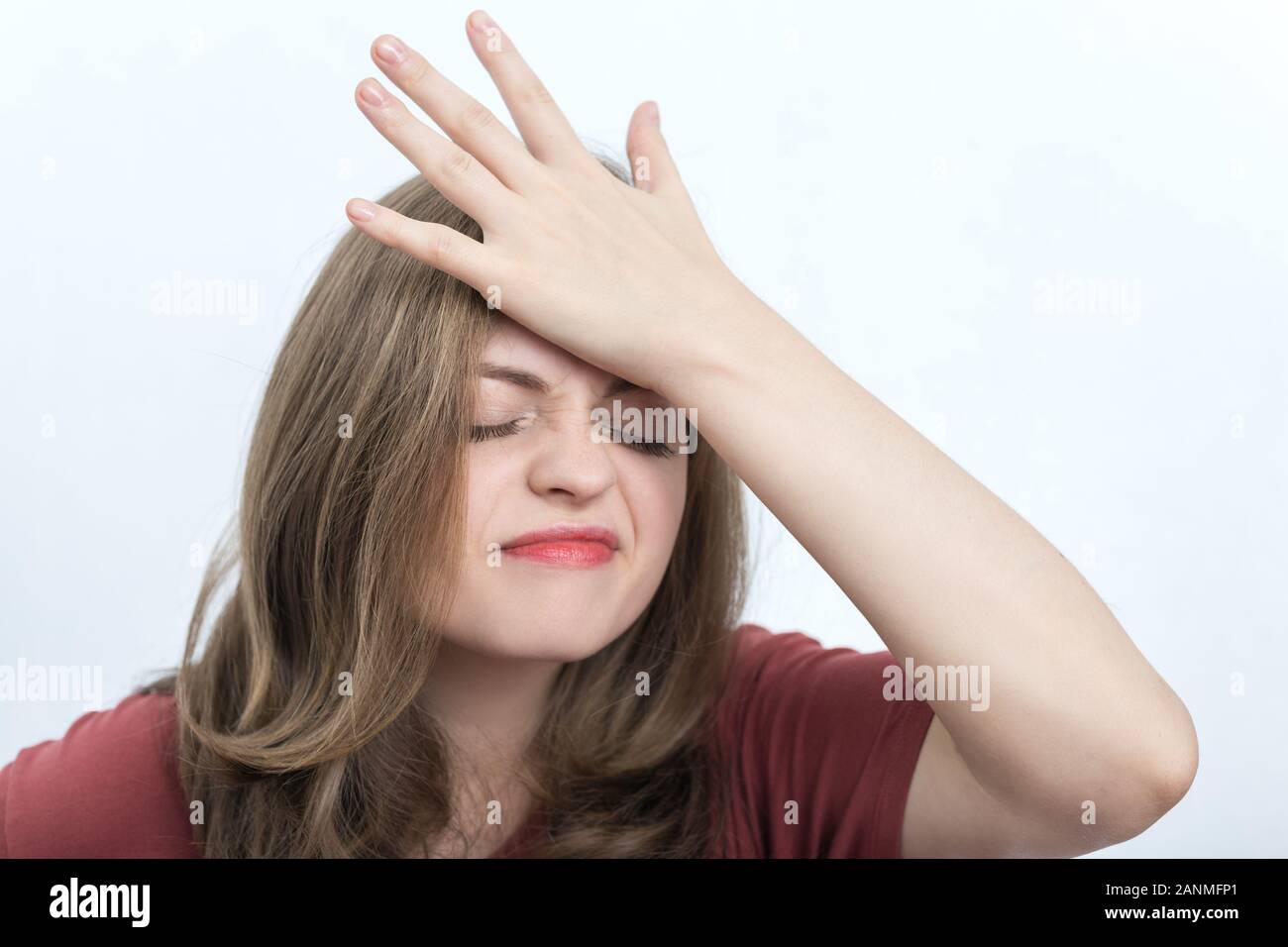 Young caucasian woman girl with puzzled, confused expression, think, forgot or remember something Stock Photo
