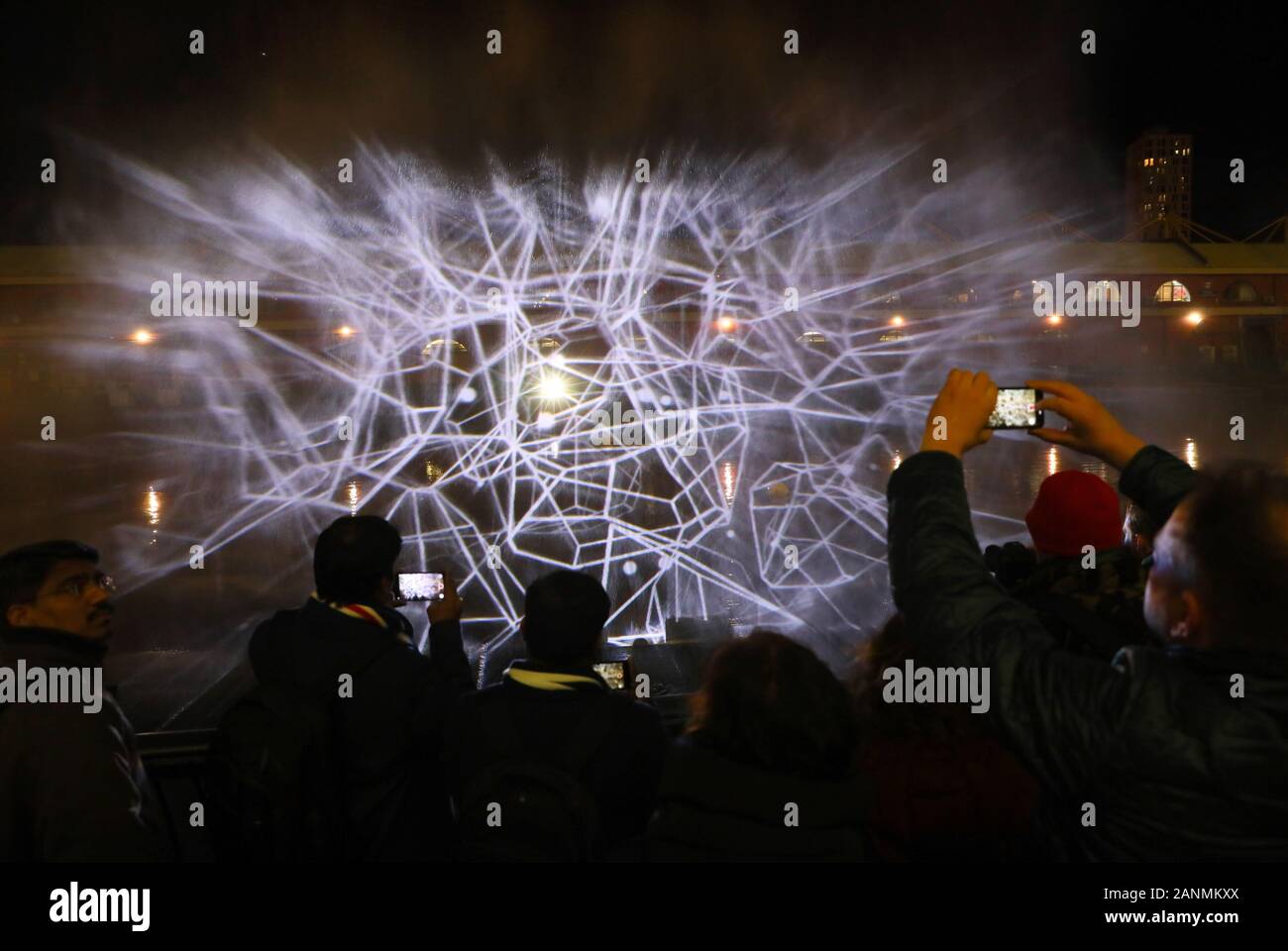 London, Britain. 17th Jan, 2020. People view a light installation titled Constellations designed by Studio Joanie Lemercier during a winter lights show at Canary Wharf in London, Britain, Jan. 17, 2020. Credit: Tim Ireland/Xinhua/Alamy Live News Stock Photo