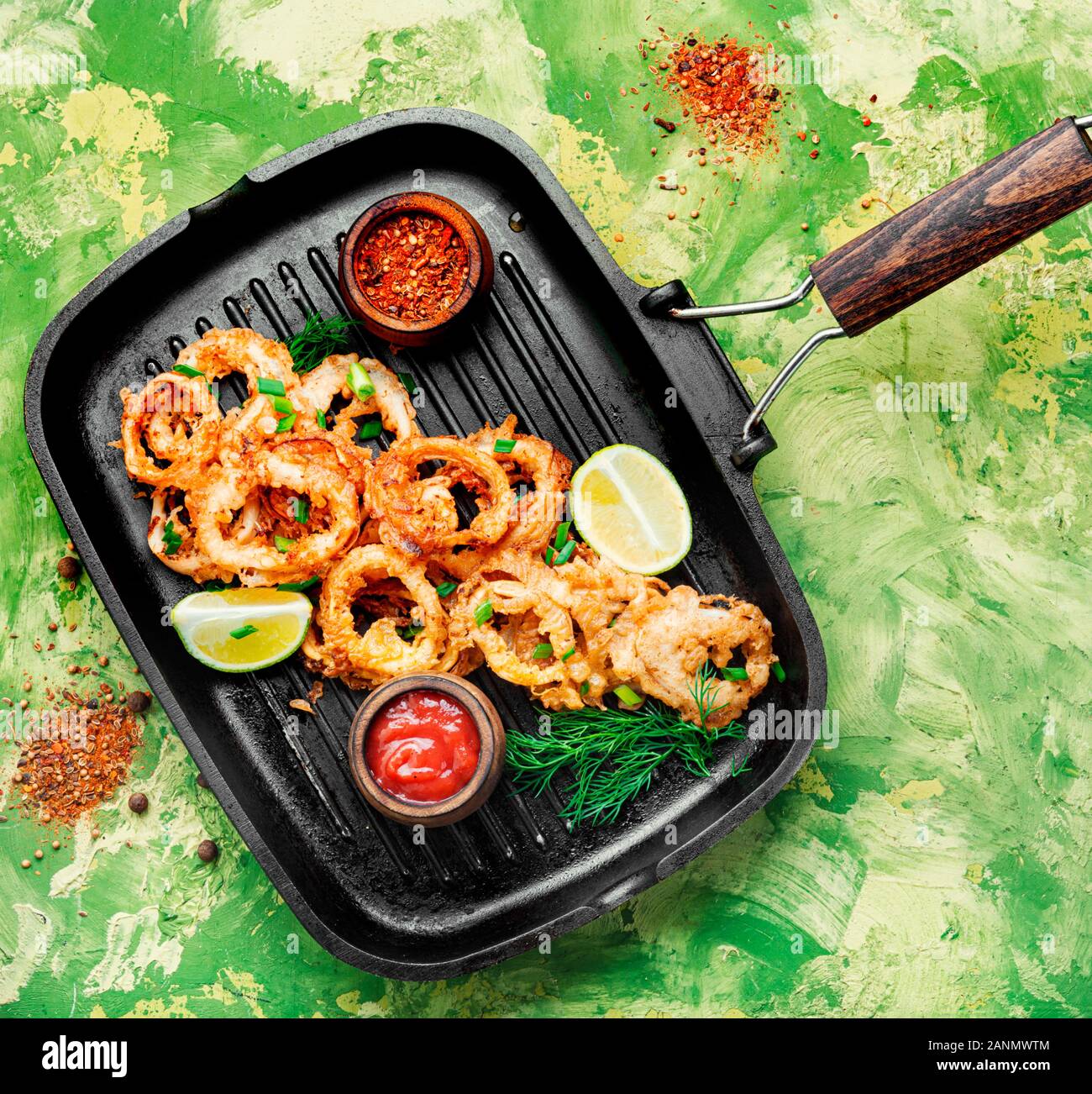 Fried calamari rings with sauce.Fast food.Fried rings of squid in the
