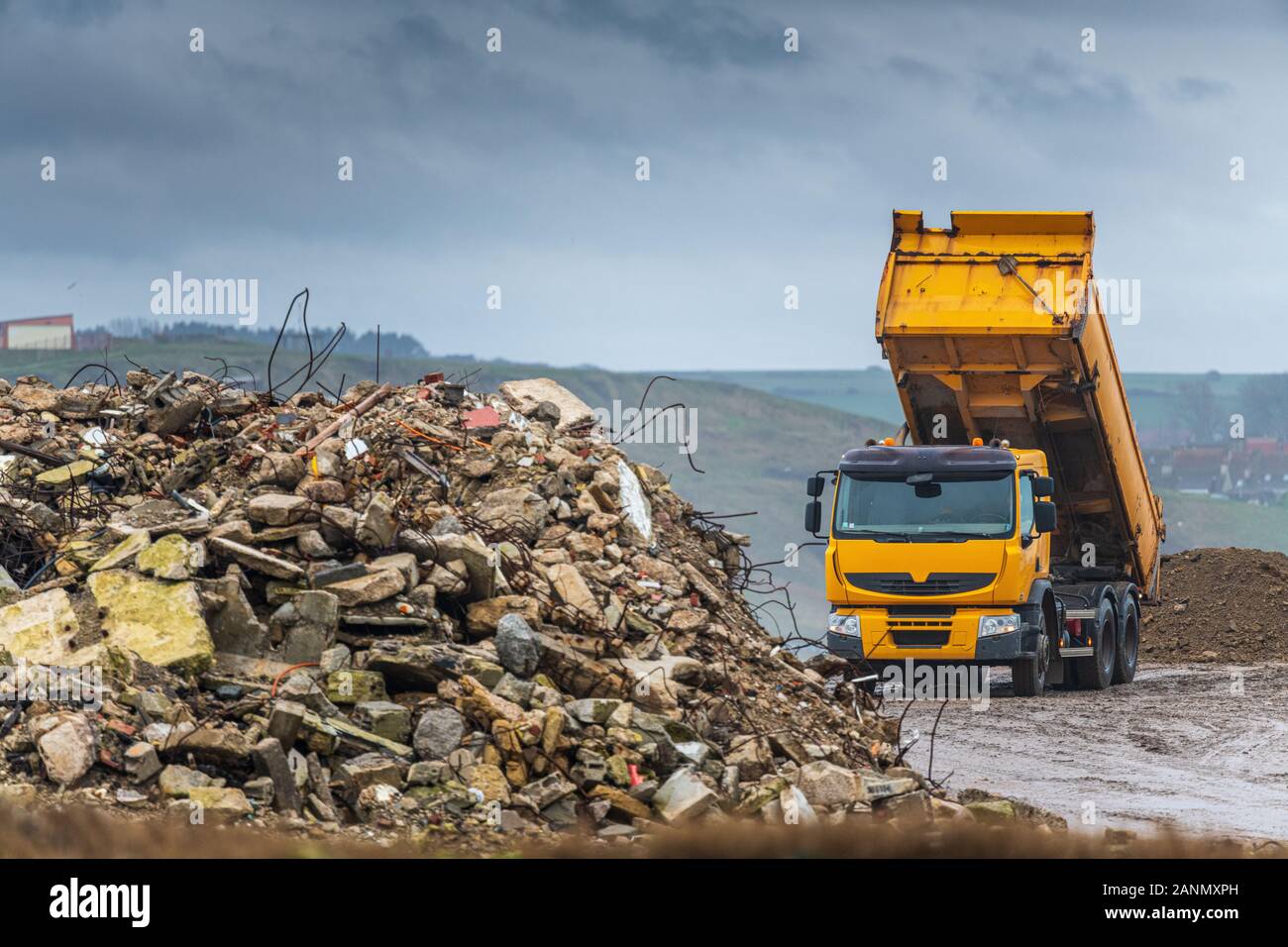 Rubble removal truck on a building site Stock Photo Alamy