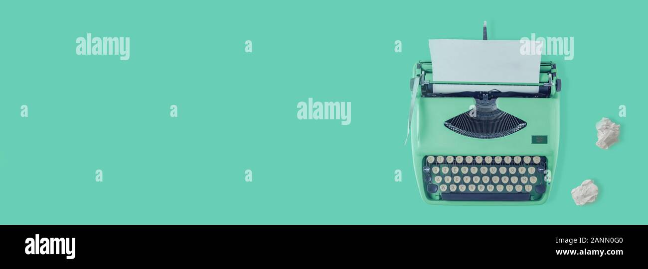 A vintage typewriter with two paper balls Stock Photo Alamy