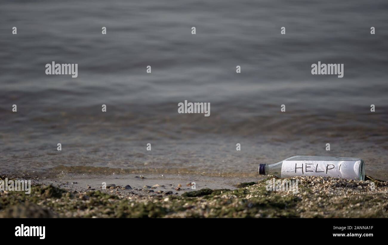 Help word hidden in bottle lying near sea, request for salvation ...