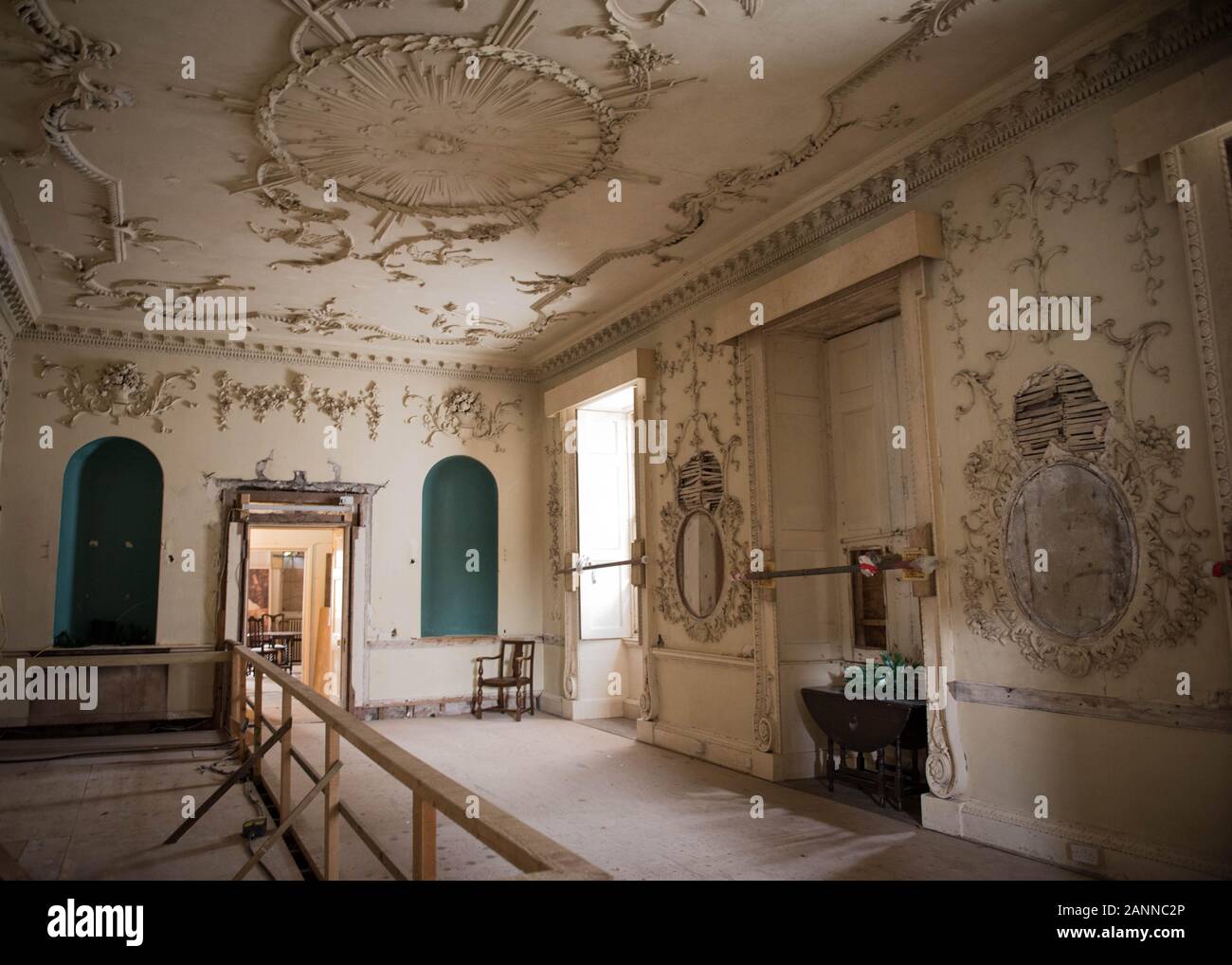 Interior of Poltimore House near Exeter in Devon UK. Currently undergoing attempted renovation but in disrepair and various stages of decline. Stock Photo