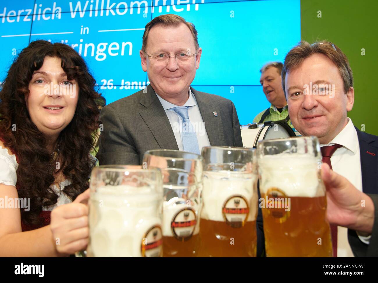 Berlin, Germany. 18th Jan, 2020. Petra Enders (l-r), District Administrator of the Ilm district in Thuringia, Bodo Ramelow (Die Linke), Minister President of Thuringia and Klaus Wagner, President of the Thuringian Farmers' Association, toast the Green Week with Arnstadt beer. Credit: Annette Riedl/dpa/Alamy Live News Stock Photo