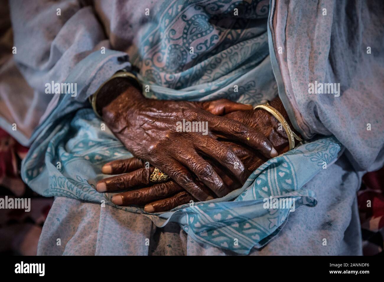 Widow's hands. Varanasi, India Stock Photo