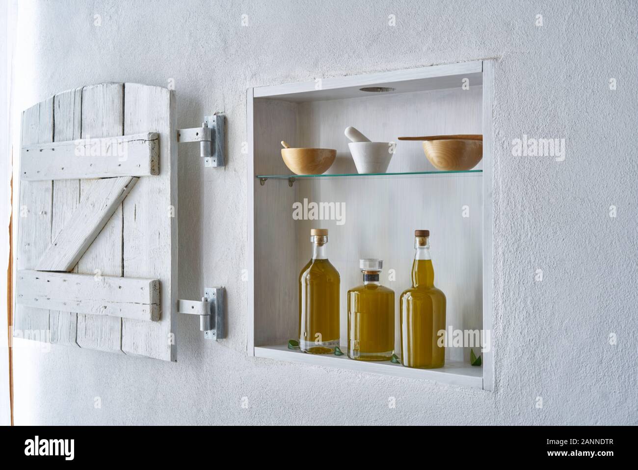 house home design wall shelf Olive oil bottle oils three bottles food cooking mediterranean natural organic tuscany beauty country house healthy Stock Photo