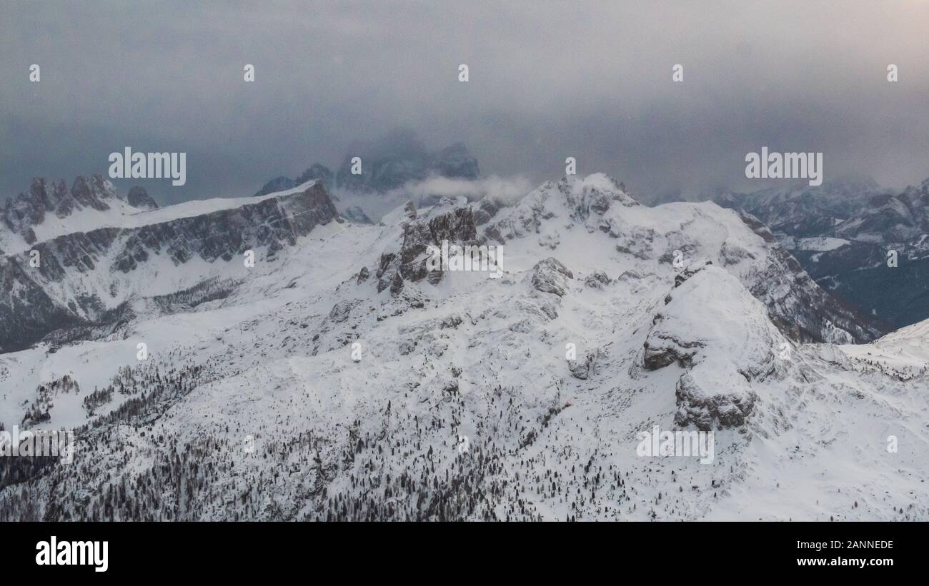 Clouds carrying snow in the italian alps Stock Photo - Alamy