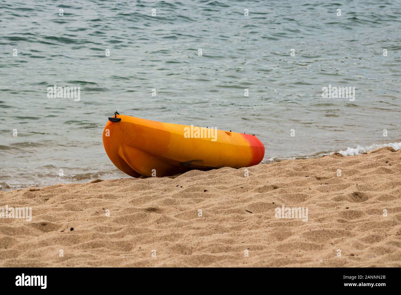 Yellow kayak on the beach of Puerto Vallarta, Mexico Stock Photo - Alamy
