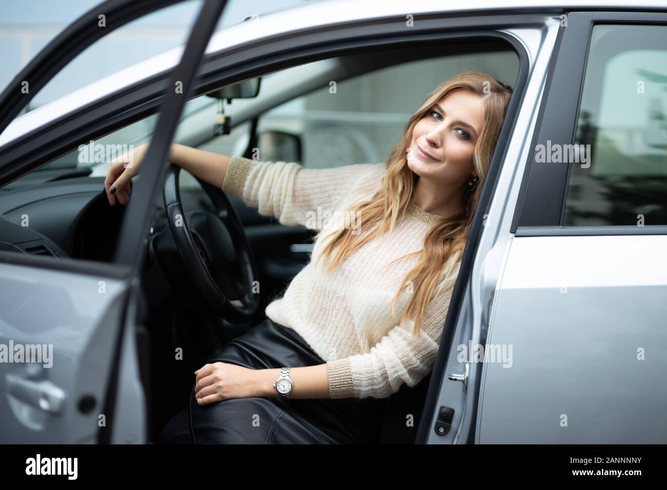 Girl sitting in drivers seat hi-res stock photography and images - Alamy