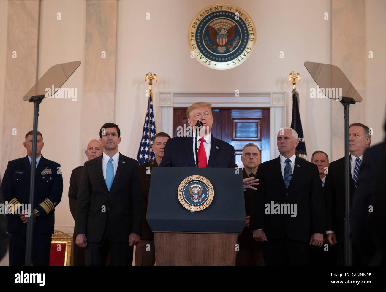 United States President Donald J. Trump delivers remarks on the Iraqi-Iranian situation in the Grand Foyer at the White House in Washington, DC on Wednesday, January 8, 2020. Trump responded to the Iranian missile attacks on U.S.-Iraqi airbases in Iraq. Identifiable behind the President from left to right: US Secretary of Defense Dr. Mark T. Esper, US Vice President Mike Pence, US Army General Mark A. Milley, Chairman of the Joint Chiefs of Staff, US Vice President Mike Pence, and US Secretary of State Mike Pompeo.Credit: Tasos Katopodis/Pool via CNP | usage worldwide Stock Photo