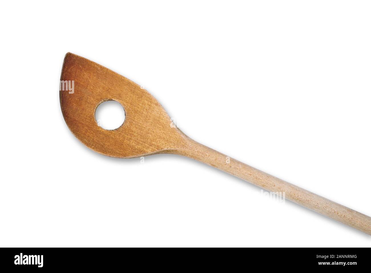 Old wooden spoon with hole, isolated Stock Photo Alamy