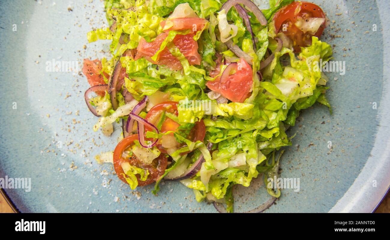 Food for vegetarian on diet salad with cherry vine tomatoe and