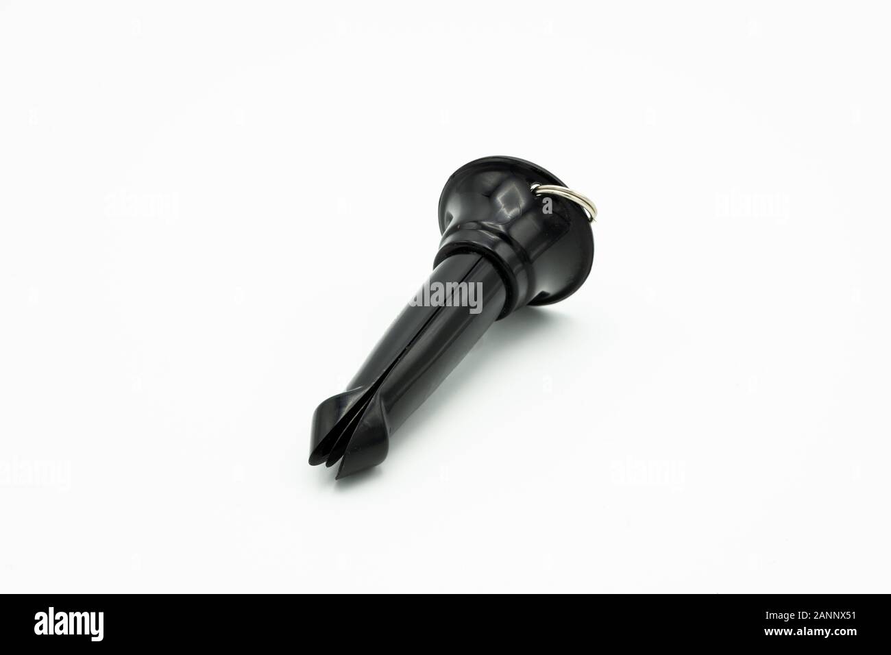 Closeup of a small instrument to produce the sound of a bird (crow