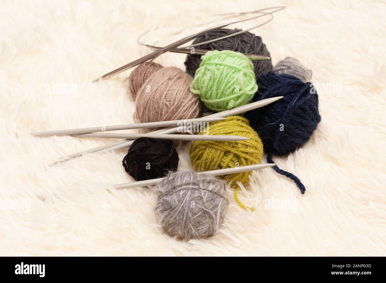 Set for knitting yarn in a ball and knitting needles. Stock photo Stock