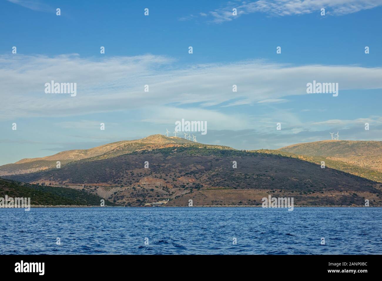 Greece. Corinthian Gulf. Hilly shores with wind farms on the peaks. View from the boat Stock Photo