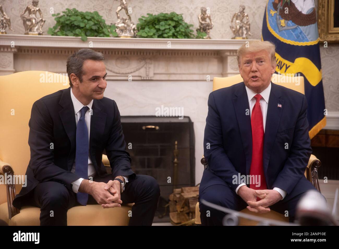 Washington, United States. 07th Jan, 2020. United States President Donald J. Trump, right, makes remarks as he greets Prime Minister Kyriakos Mitsotakis of Greece, left, in the Oval Office of the White House in Washington, DC on Tuesday, January 7, 2020. Credit: Tasos Katopodis/Pool via CNP/AdMedia/Newscom/Alamy Live News Stock Photo