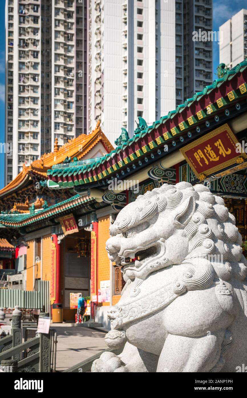 HongKong, China - November, 2019: Dragon sculpture and traditional Chinese architecture in Wong Tai Sin Temple in Hong Kong Stock Photo