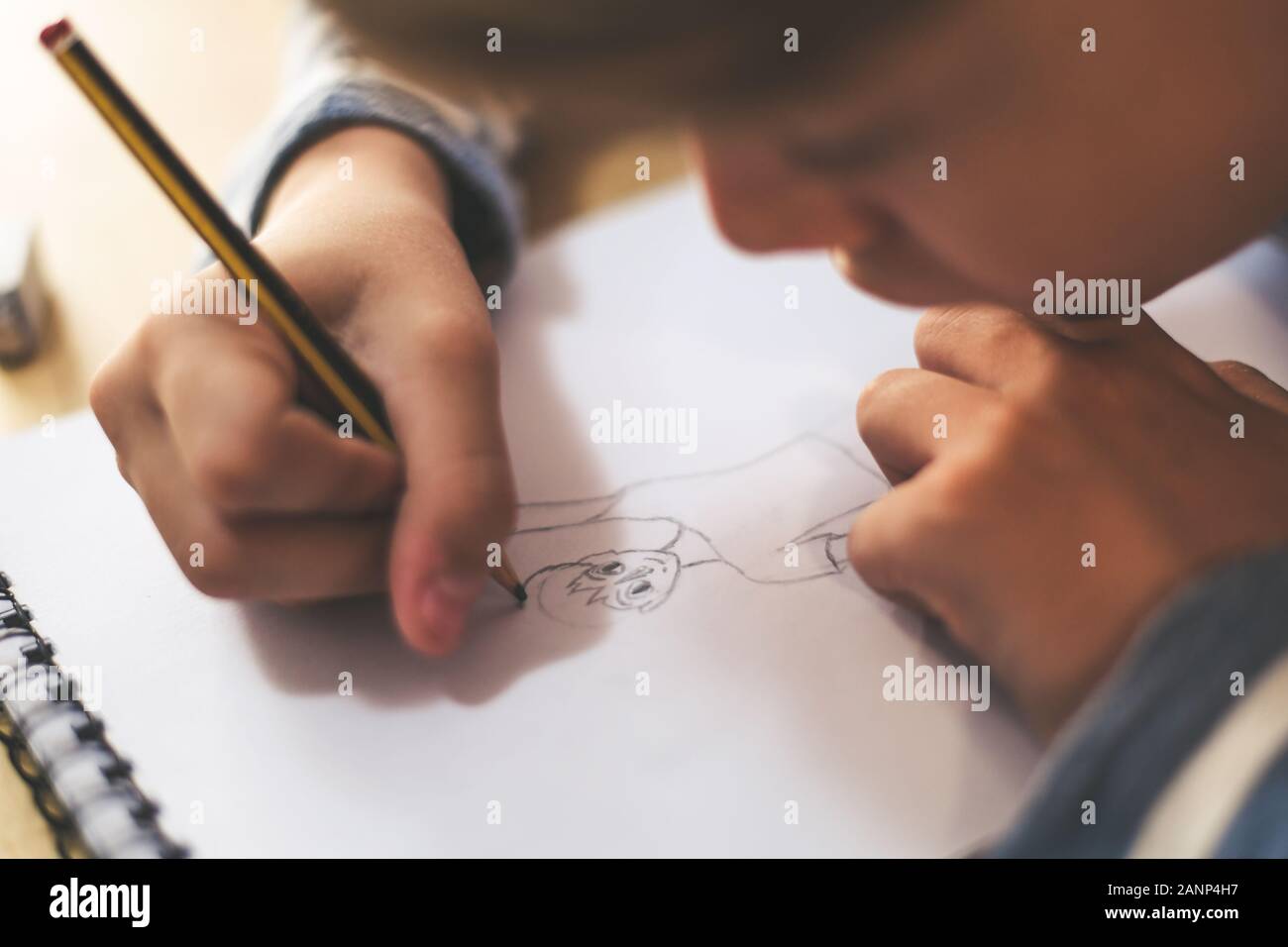 Close Up View Of Student Drawing With Pencil Boy Doing Homework Writing On A Paper Kid Hold A Pencil And Draw A Manga At Home Teen Drawing Sitting Stock Photo Alamy