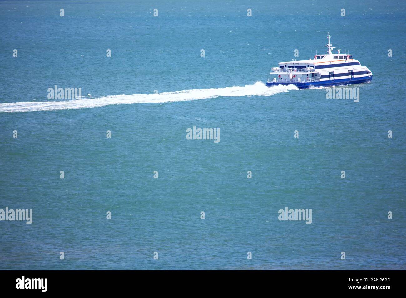 modern passenger boat speeding on the sea Stock Photo - Alamy