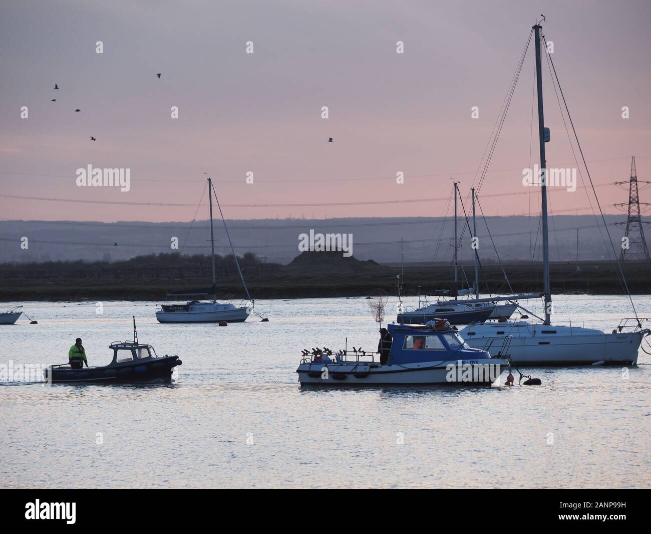 Queenborough, Kent, UK. 18th Jan, 2020. UK Weather: the trot boat at sunset in Queenborough Habour, Kent on a cold evening. Credit: James Bell/Alamy Live News Stock Photo