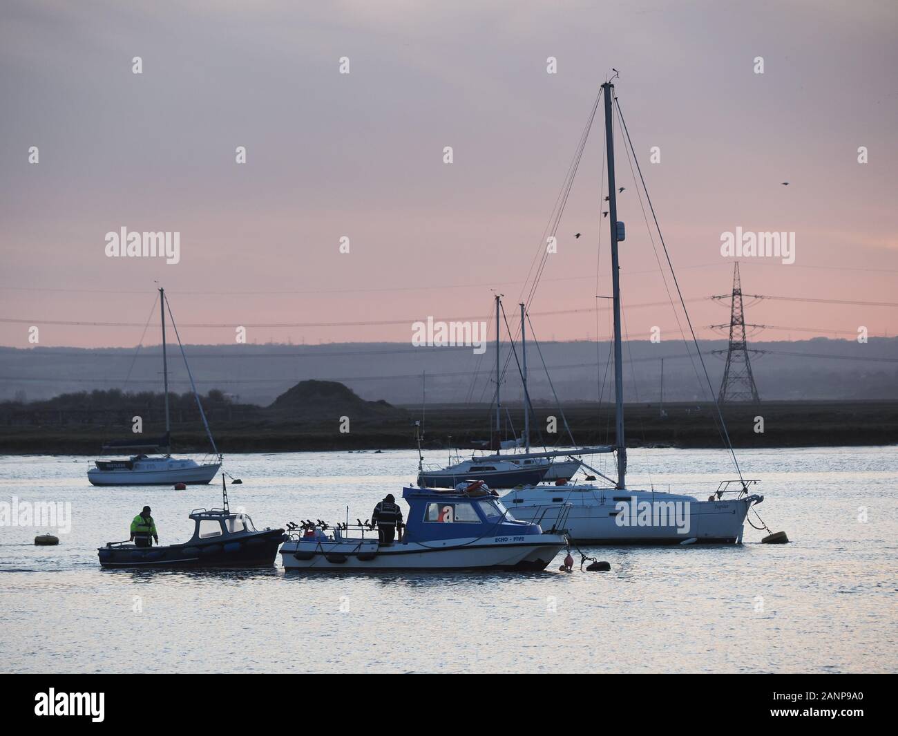 Queenborough, Kent, UK. 18th Jan, 2020. UK Weather: the trot boat at sunset in Queenborough Habour, Kent on a cold evening. Credit: James Bell/Alamy Live News Stock Photo