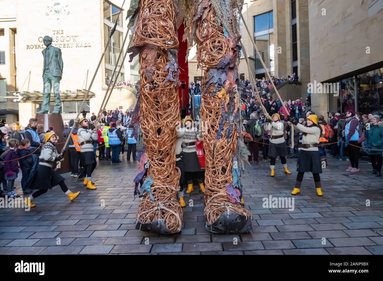 Glasgow, Scotland, UK. 18th January, 2020. A ten metre tall giant puppet called Storm attends Celtic Connections Coastal Day. Puppeteers from Vision Mechanics operate the mythical sea goddess which was two years in the making. The puppet is made from entirely recycled and natural resources. Marking the start of Scotland’s Year of Coasts & Waters, Storm will strive to remind us of our duty to care for our coastlines. Credit: Skully/Alamy Live News Stock Photo