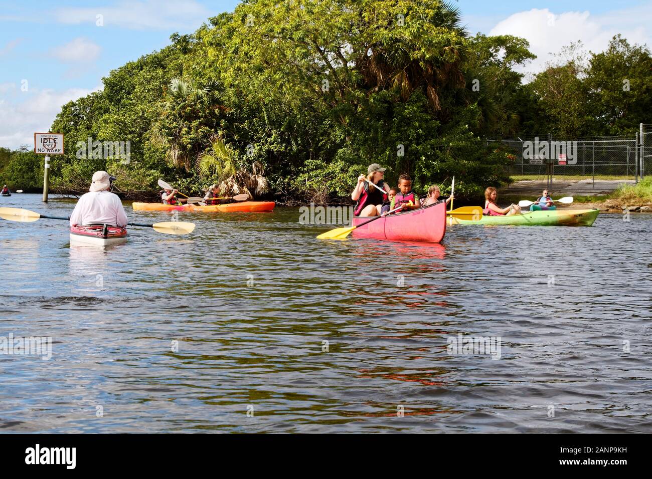 people looking for manatees, kayaks, canoe, recreation, exercise, water