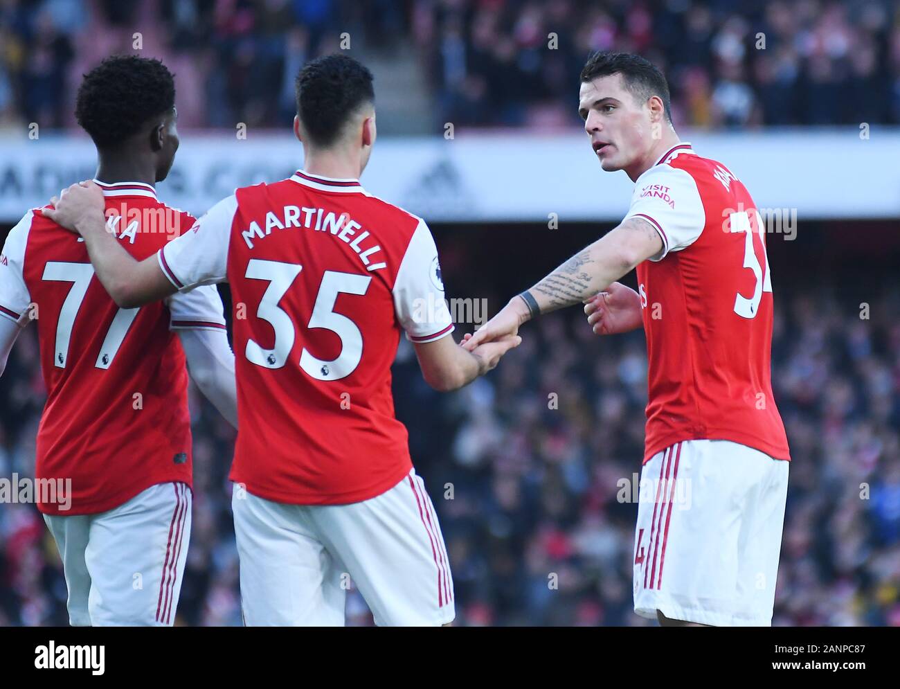 LONDON, ENGLAND - JANUARY 18, 2020: Gabriel Martinelli of Arsenal celebrates with Granit Xhaka of Arsenal after he scored a goal during the 2019/20 Premier League game between Arsenal FC and Sheffield United FC at Emirates Stadium. Stock Photo