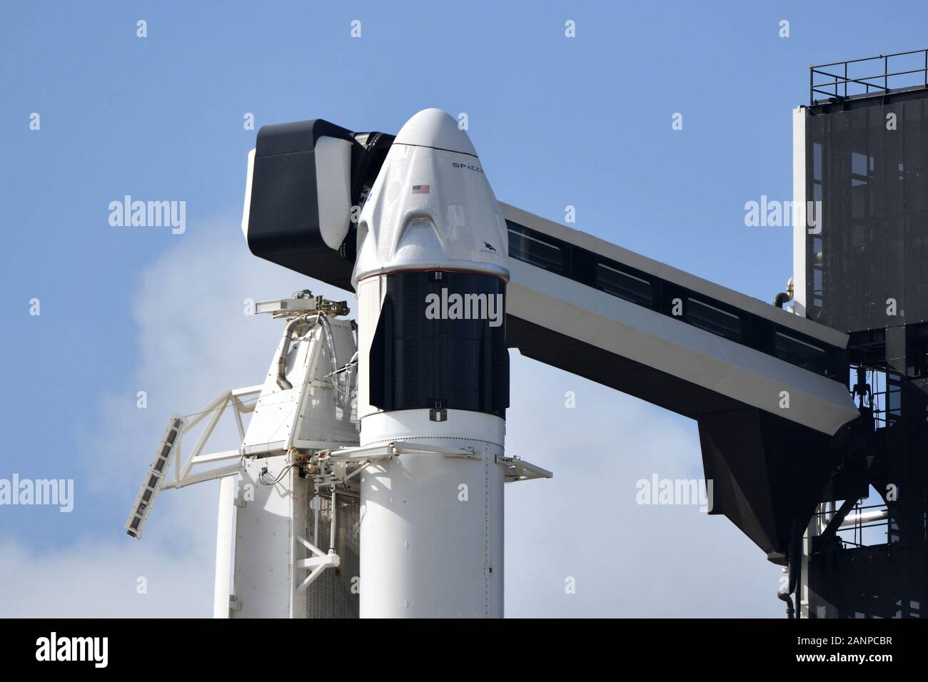 Kennedy Space Center, Florida, USA. 18th Jan, 2020. Following a 24 hour delay due to heavy seas, a SpaceX Crew Dragon spacecraft sits atop a Falcon 9 rocket on Launch Complex 39A at the Kennedy Space Center, Florida on Friday, January 18, 2020. SpaceX will conduct a launch abort test which is required by NASA to assure safety for future crewed missions to the International Space Station.Photo by Joe Marino-Bill Cantrell/UPI Credit: UPI/Alamy Live News Stock Photo