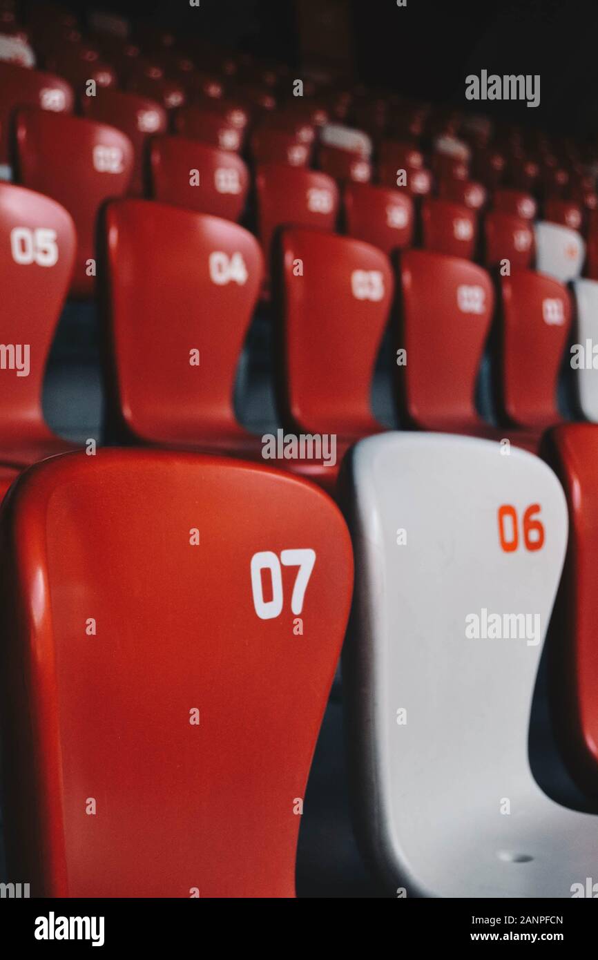 Red seats inside the Beijing National Stadium or Bird's Nest designed by architects Herzog & de Meuron Stock Photo