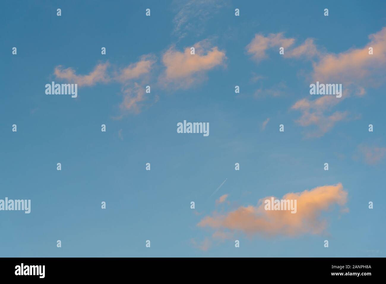 Colorful sunset sky background with reddish colors Stock Photo