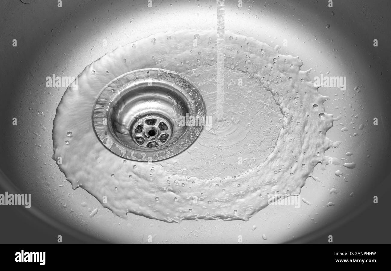 View of the sink, drain and flowing water Stock Photo Alamy