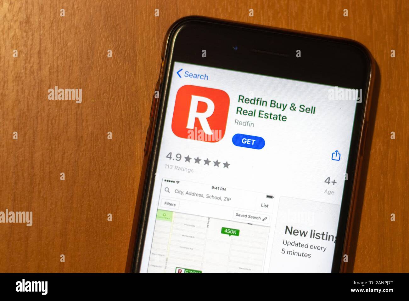Los Angeles, California, USA - 17 January 2020: Phone screen with Redfin icon on app store top view, Illustrative Editorial Stock Photo
