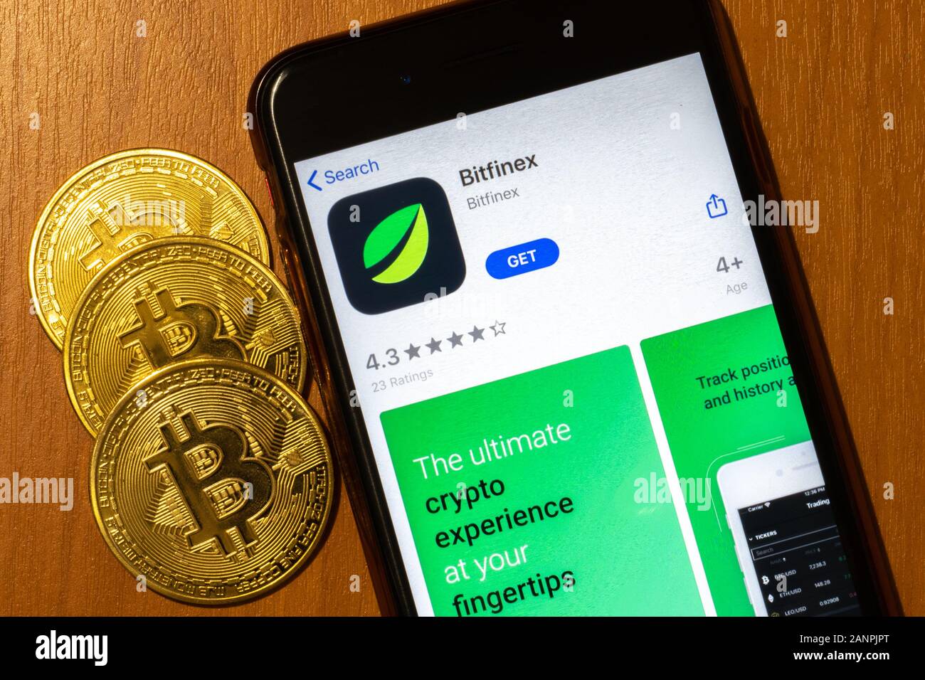 Los Angeles, California, USA - 17 January 2020: Bitfinex app logo with cryptocurrency, Illustrative Editorial Stock Photo