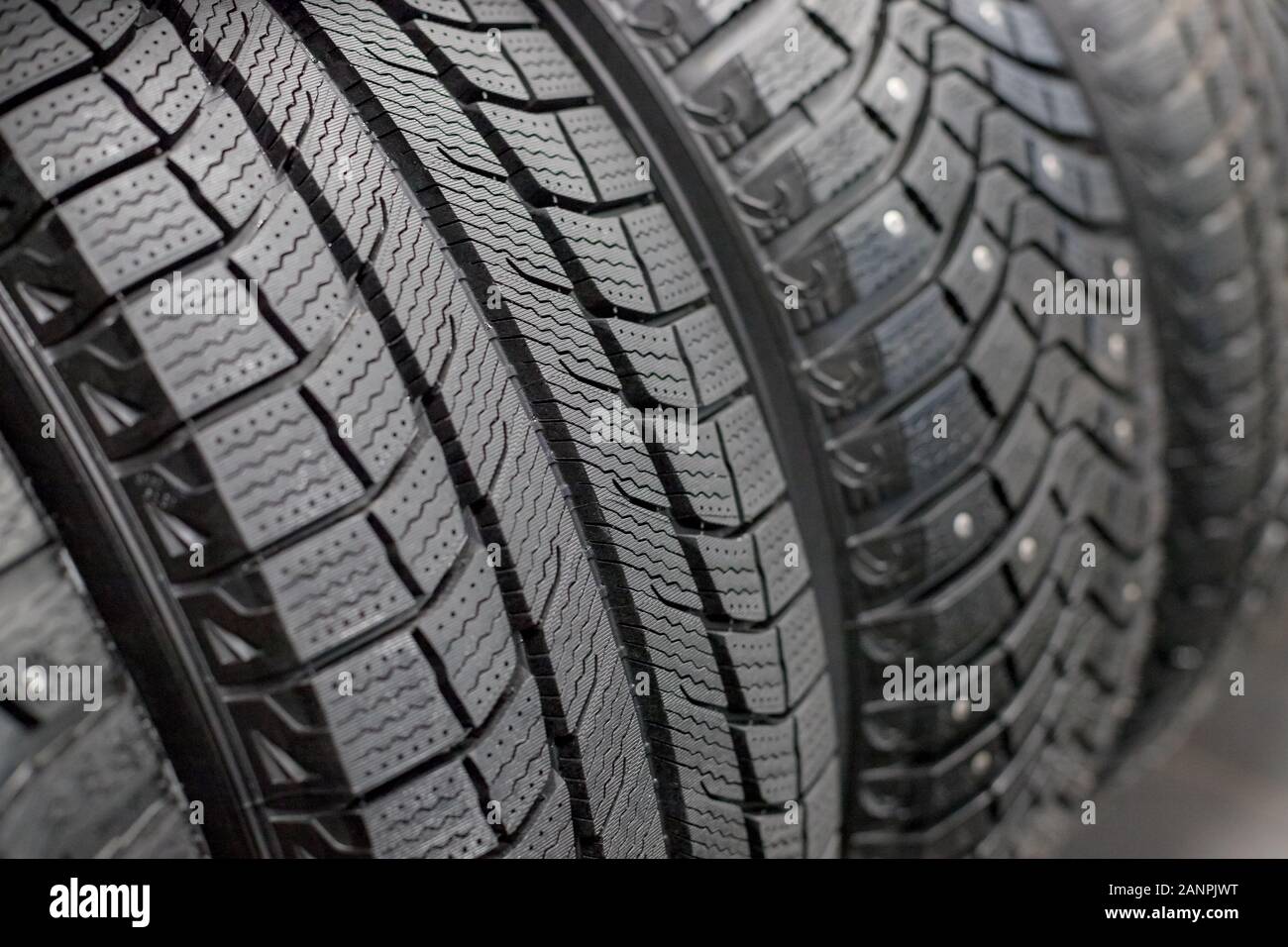 New black car tire, closeup.Tire stack background Stock Photo Alamy