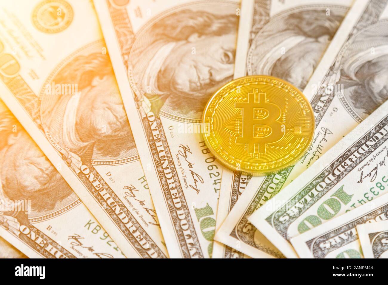 Physical version of Bitcoin on the one hundred american dollars. Business  concept of worldwide cryptocurrency Stock Photo - Alamy