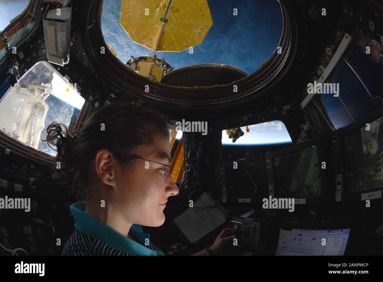 ISS - 18 Jul 2019 - NASA astronaut Christina Koch makes observations from the International space Station's cupola. Koch has already made history once Stock Photo