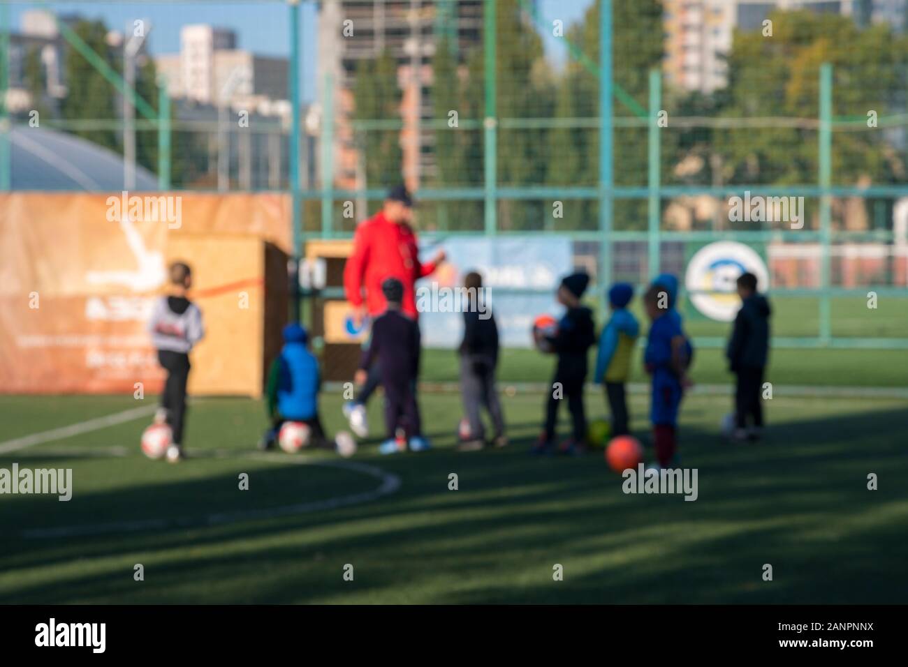 Boys at a football training. The concept of a healthy lifestyle and