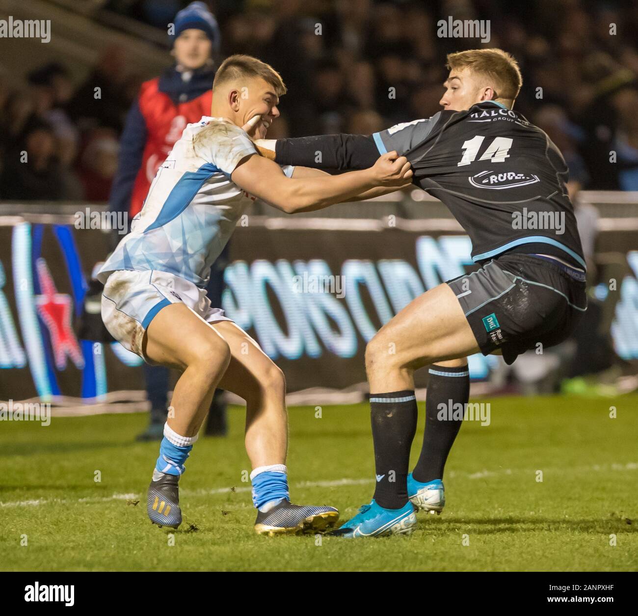 18th January 2020; AJ Bell Stadium, Salford, Lancashire, England; European Champions Cup Rugby, Sale Sharks versus Glasgow Warriors; Kyle Steyn of Glasgow Warriors tangles with Joe Carpenter of Sale Sharks - Editorial Use Stock Photo