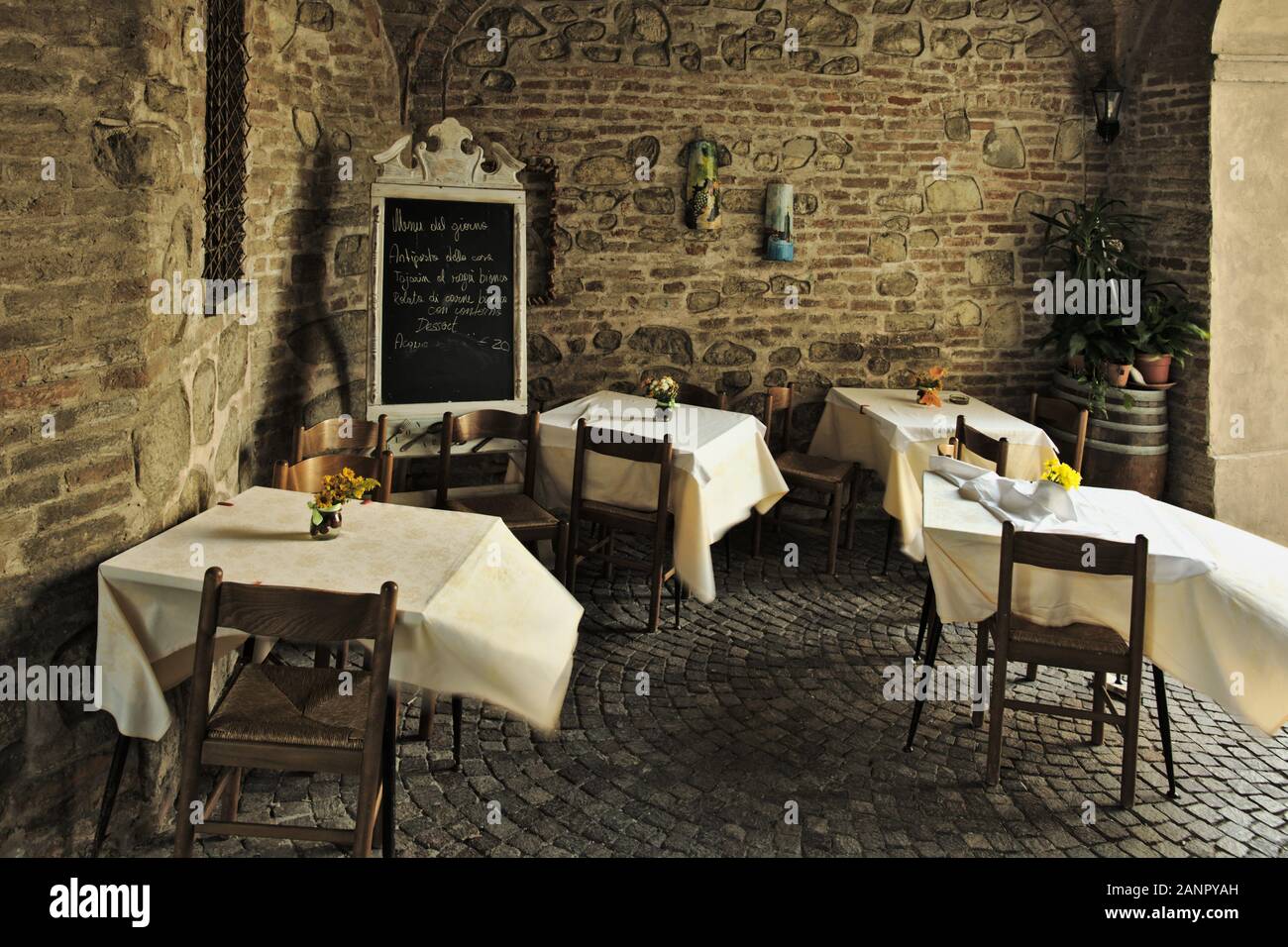 Tables in the wind of a restaurant at Sacro Monte di Crea set outside - Sacro Monte di Crea, Monferrato, Serralunga (AL), Piedmont, Italy (2019) Stock Photo