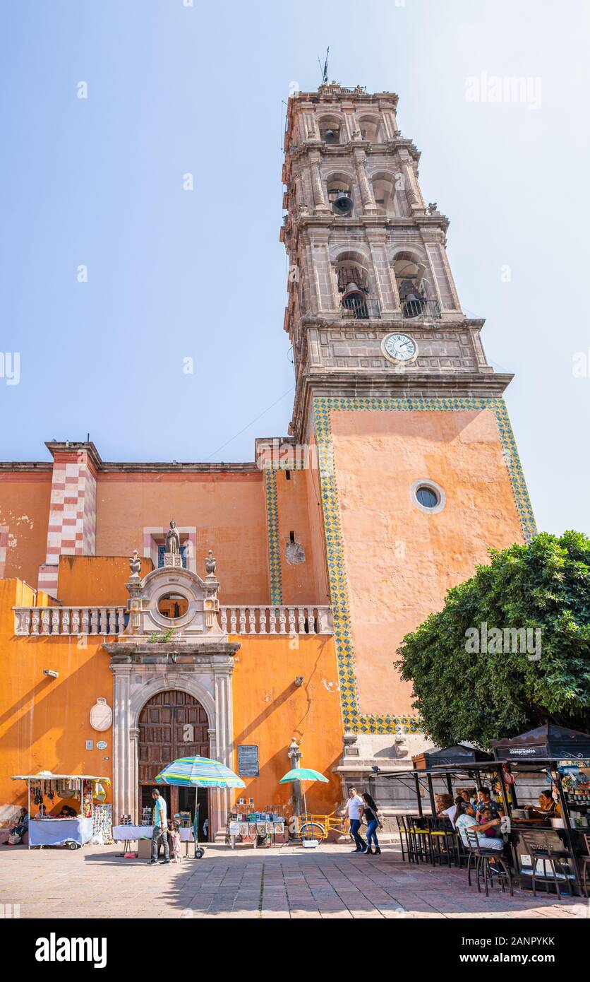 Celaya, Guanajuato, Mexico - November 24, 2019: People walking among street vendors infront of the Immaculate Conception Cathedral Stock Photo