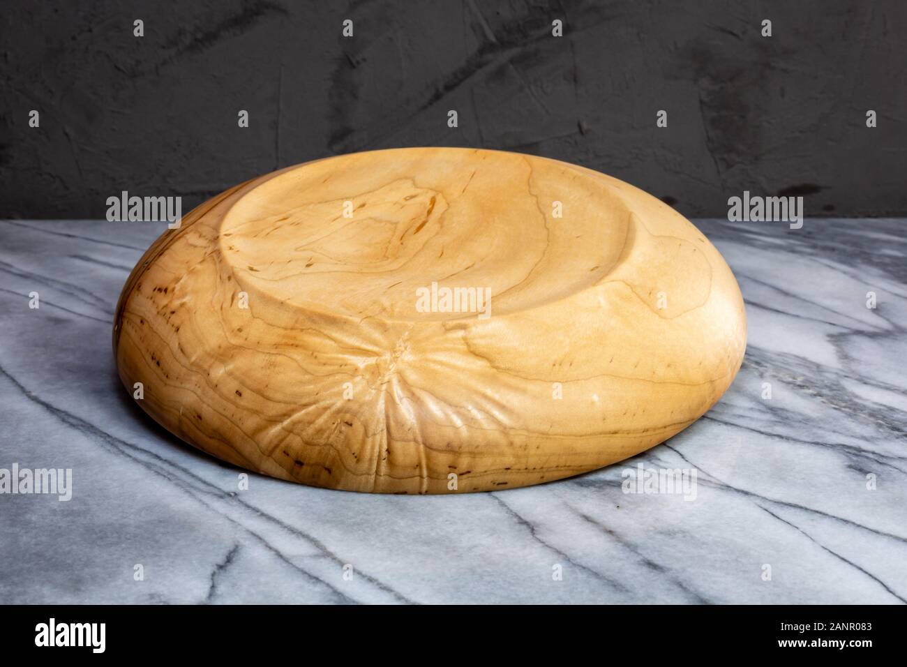 Wormy maple wood nut bowl or serving bowl hand turned kitchen decor Stock Photo