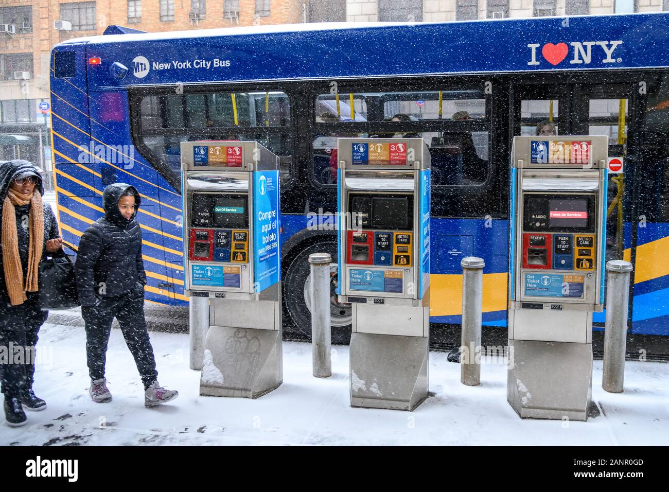New York, USA,  18 January 2020. Two out of three ticket dispensers are out of order at a bus stop in New York City's Upper West Side during a snowstorm.   Credit: Enrique Shore/Alamy Live News Stock Photo