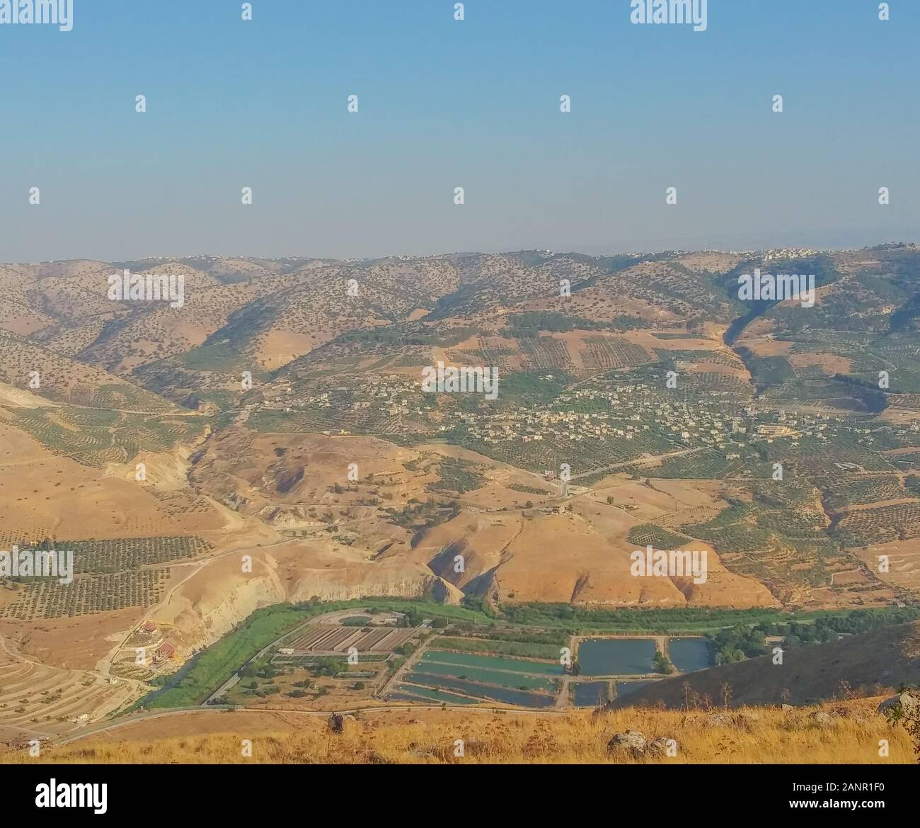 The view of syria arab republic from the golan heights at the border